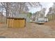 Detached storage shed with RV and home on spacious lot at 2020 Moore Rd, Moreland, GA 30259