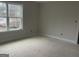 Bedroom featuring a window bringing in natural light during the construction phase at 240 Jay Trl, Fayetteville, GA 30215