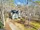 Two-story home with driveway and landscaping, viewed from above at 232 Terrane Rdg, Peachtree City, GA 30269