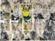 An aerial view shows a home nestled among trees, highlighting its lot and surrounding neighborhood at 232 Terrane Rdg, Peachtree City, GA 30269