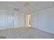 Spacious basement room with neutral carpet and view of bathroom from the opened door at 232 Terrane Rdg, Peachtree City, GA 30269