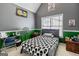 Bedroom with gray and green walls, and skull bedding at 232 Terrane Rdg, Peachtree City, GA 30269