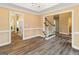 Dining room boasting hardwood floors and detailed trim work, adjacent to the main foyer at 232 Terrane Rdg, Peachtree City, GA 30269