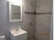Bathroom with shower and single vanity at 423 Center Sw Cir, Conyers, GA 30094