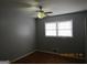 Bedroom with hardwood floors and neutral walls at 423 Center Sw Cir, Conyers, GA 30094