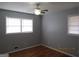 Bright bedroom with hardwood floors and neutral walls at 423 Center Sw Cir, Conyers, GA 30094