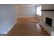 Living room with hardwood floors and fireplace at 423 Center Sw Cir, Conyers, GA 30094