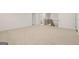 Bright, open loft area with neutral carpet, ideal for relaxing or entertaining at 1715 Goodwin Dr, Hampton, GA 30228