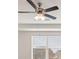 Bedroom ceiling fan with attached lighting and recessed ceiling at 663 Edgar St # 25, Hampton, GA 30228