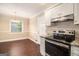 Well-equipped kitchen boasts granite countertops and stainless steel appliances at 3435 Misty Valley Rd, Decatur, GA 30032