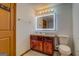 Basement bathroom with vanity and mirror at 2436 Green Hollow Ct, Conyers, GA 30012