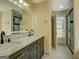 Elegant bathroom with double vanity and marble countertops at 2436 Green Hollow Ct, Conyers, GA 30012