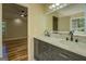 Modern bathroom with double vanity and marble countertops at 2436 Green Hollow Ct, Conyers, GA 30012