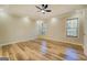 Spacious bedroom with wood floors and ceiling fan at 2436 Green Hollow Ct, Conyers, GA 30012