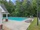 Relaxing community pool with lounge chairs and cabana at 2436 Green Hollow Ct, Conyers, GA 30012