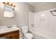 Bathroom with toilet, tub/shower combo and sink at 1471 Cedar Creek Ln, Riverdale, GA 30296