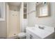 Bathroom featuring shower, shelving, vanity and toilet at 1471 Cedar Creek Ln, Riverdale, GA 30296