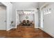 Dining room with hardwood floors and a chandelier at 209 Enfield Ln, Mcdonough, GA 30252