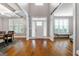 Bright two-story entryway with hardwood floors at 209 Enfield Ln, Mcdonough, GA 30252