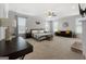 Large main bedroom with sitting area and carpet flooring at 209 Enfield Ln, Mcdonough, GA 30252