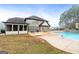 Inviting in-ground pool with a large backyard at 209 Enfield Ln, Mcdonough, GA 30252