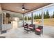 Relaxing screened porch overlooking the backyard and pool at 209 Enfield Ln, Mcdonough, GA 30252