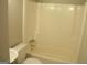 Clean bathroom with bathtub and shower at 295 Adena W Ln, South Fulton, GA 30349