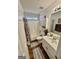 Clean bathroom with a tub, shower, and vanity at 52 Shadow Ct, Palmetto, GA 30268