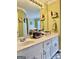 Double vanity bathroom with granite countertops and ample storage at 52 Shadow Ct, Palmetto, GA 30268