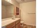 Bathroom featuring a single sink vanity with a mirror and wood cabinet at 3954 Swathmore Ln, Duluth, GA 30096