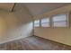 A room featuring three windows with a carpeted floor at 3954 Swathmore Ln, Duluth, GA 30096