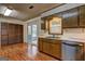 Kitchen with wood cabinets, stainless steel appliances, and a sliding door at 3954 Swathmore Ln, Duluth, GA 30096