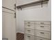 Walk-in closet featuring custom shelving and storage solutions at 65 Riverside Way, Sharpsburg, GA 30277