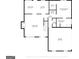 Detailed first floor plan featuring a large living room, kitchen, and Primary bedroom with an attached garage at 65 Riverside Way, Sharpsburg, GA 30277