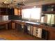 Kitchen featuring wood cabinets, stainless steel appliances, and ample counter space at 138 Le Brun Ne Rd, Atlanta, GA 30342