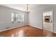 Dining room with hardwood floors and chandelier at 2160 Robin Hood Trl, Cumming, GA 30040