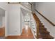 Bright entryway with hardwood floors and staircase at 2160 Robin Hood Trl, Cumming, GA 30040