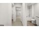 Bathroom with a tub, toilet, and double vanity at 11996 Conrad Cir # 128, Hampton, GA 30228