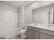 Main bathroom with double vanity and a shower/tub combo at 11996 Conrad Cir # 128, Hampton, GA 30228