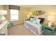 Bright bedroom with daybed and cheerful decor at 11996 Conrad Cir # 128, Hampton, GA 30228