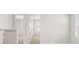 Bright hallway with access to bedrooms and bathrooms at 11996 Conrad Cir # 128, Hampton, GA 30228
