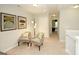 Upstairs sitting area with two comfy armchairs and natural light at 11996 Conrad Cir # 128, Hampton, GA 30228