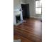 Bedroom with hardwood floors and fireplace at 1786 Lakewood Se Ave, Atlanta, GA 30315