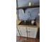 Modern kitchen sink with butcher block countertops and stainless steel faucet at 1786 Lakewood Se Ave, Atlanta, GA 30315