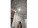 Laundry room with decorative tin ceiling and white walls at 1786 Lakewood Se Ave, Atlanta, GA 30315