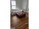 Living room features hardwood floors and a comfortable seating area at 1786 Lakewood Se Ave, Atlanta, GA 30315