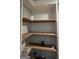 Simple pantry with wooden shelves offering ample storage at 1786 Lakewood Se Ave, Atlanta, GA 30315