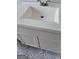 Bathroom vanity with geometric-patterned tile flooring at 1839 Lakewood Se Ave, Atlanta, GA 30315