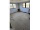 Bedroom with light hardwood floors, white walls, and two windows at 1839 Lakewood Se Ave, Atlanta, GA 30315
