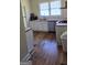 Kitchen features white cabinets, wood countertops, and stainless steel appliances at 1839 Lakewood Se Ave, Atlanta, GA 30315